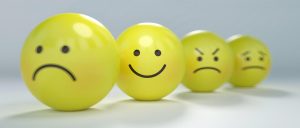 Yellow balls with different facial expression